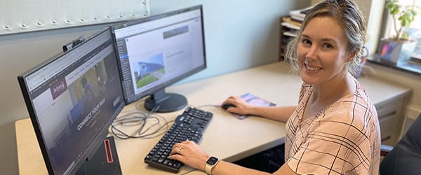 Web Designer Ashley Banks at Computer