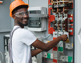 male student working on electrical meter