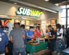 people in line at subway