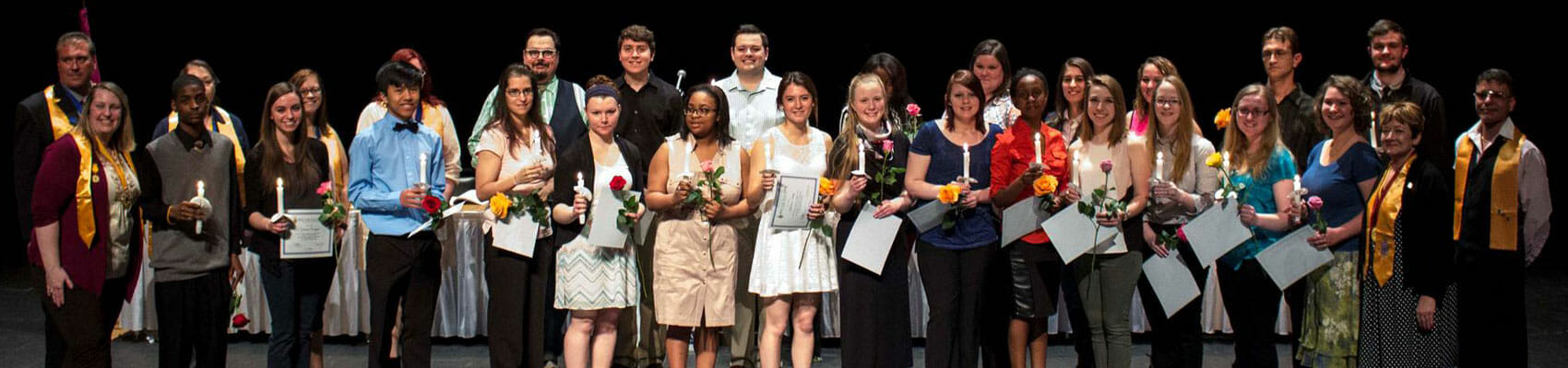 PTK students on stage at awards ceremony