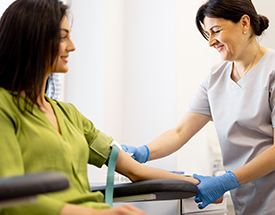 Phlebotomy Technician taking blood