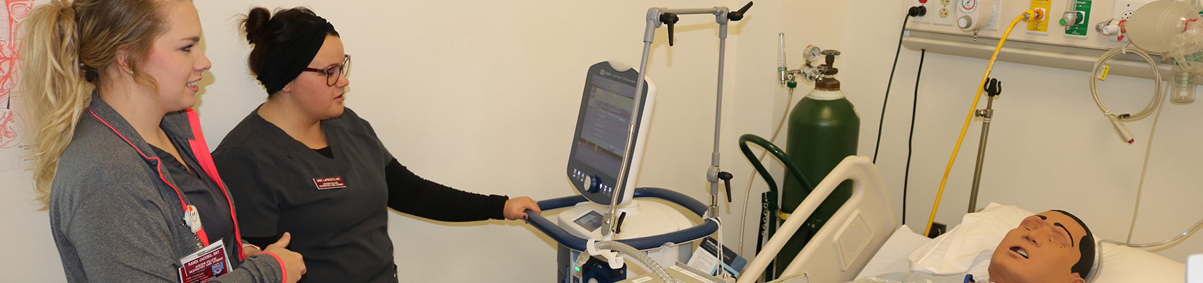 female student at respiratory machine