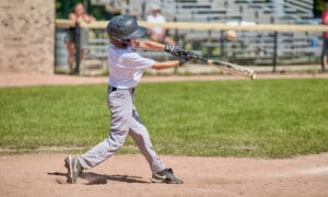 youth baseball player up to bat