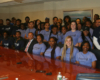 group of female students in blue tshirts