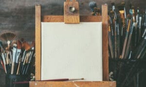 blank canvas sitting on wood easel
